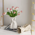 Cream-colored ceramic vase ornaments