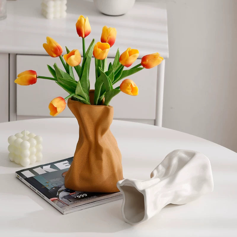 Cream-colored ceramic vase ornaments