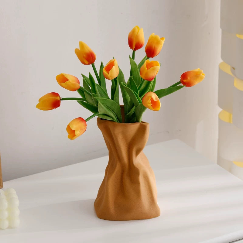Cream-colored ceramic vase ornaments