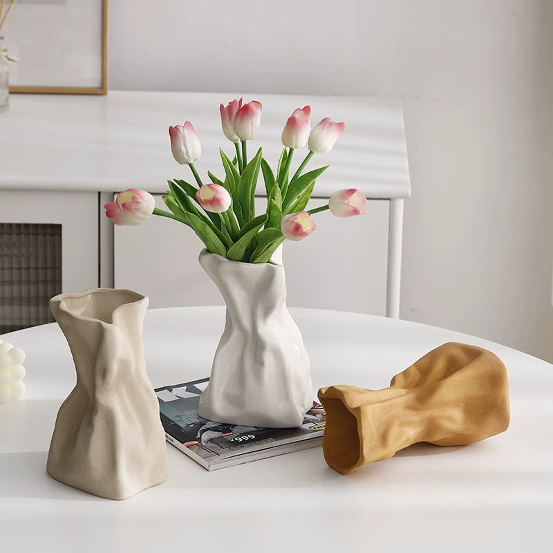 Cream-colored ceramic vase ornaments